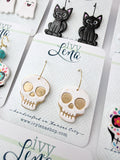Handcrafted Polymer Clay Earrings- Golden Eye Skulls